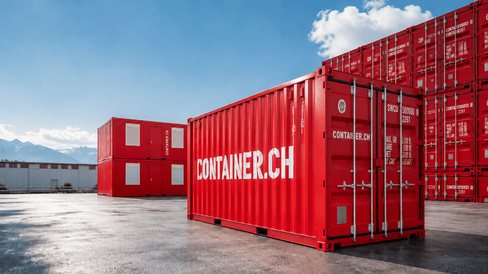 Rote Container von Container.ch vor Schweizer Bergkulisse